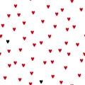 Romantic seamless pattern with red and black hearts on a white background. Valentine`s Day. Royalty Free Stock Photo